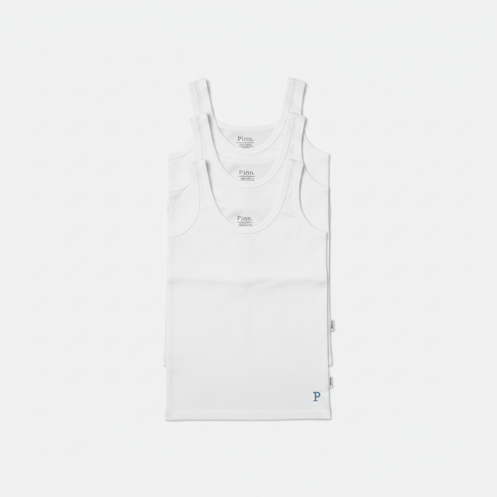 Three white tanks stacked vertically
