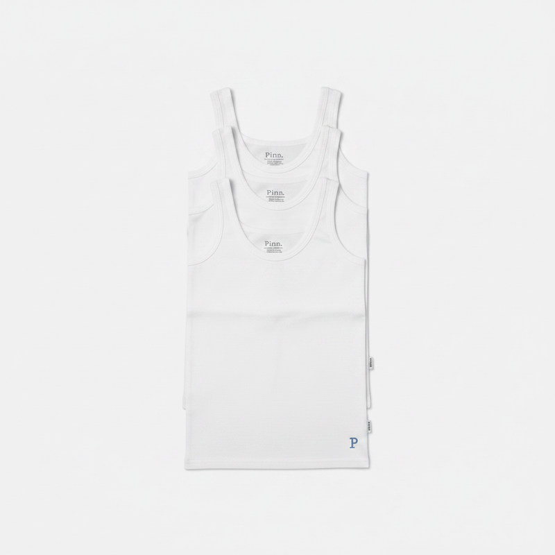 Three white tanks stacked vertically